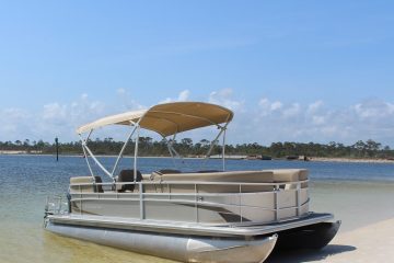 a small boat in a body of water